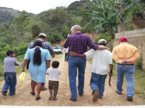 people walking together in rural area