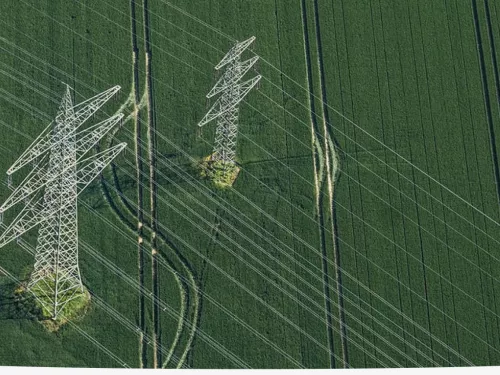 power towers in a field
